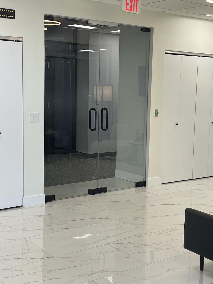 All-glass double doors at an office entrance
