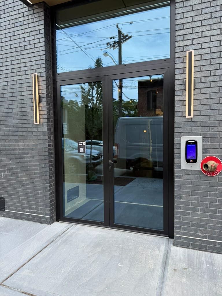 Aluminum entrance double doors with transom