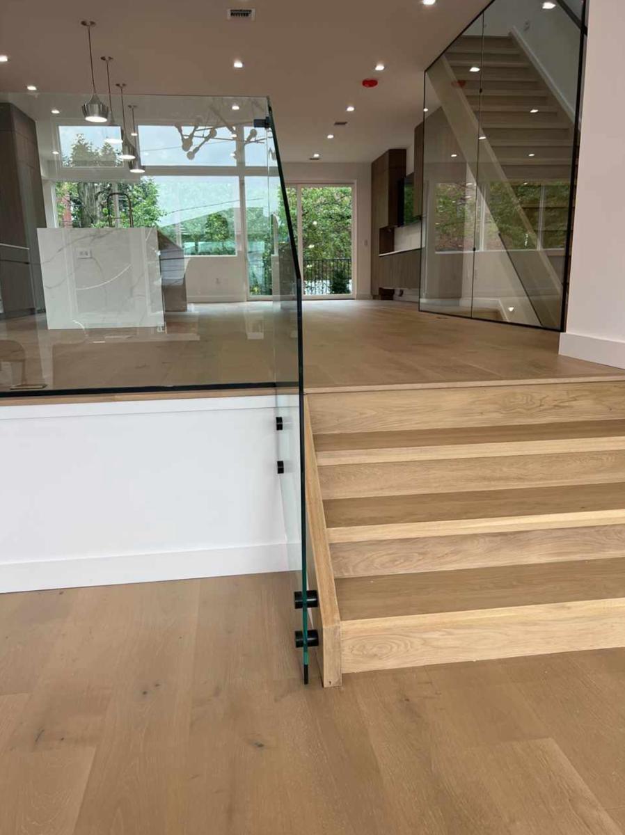Glass wall and stair guard in an open floor plan