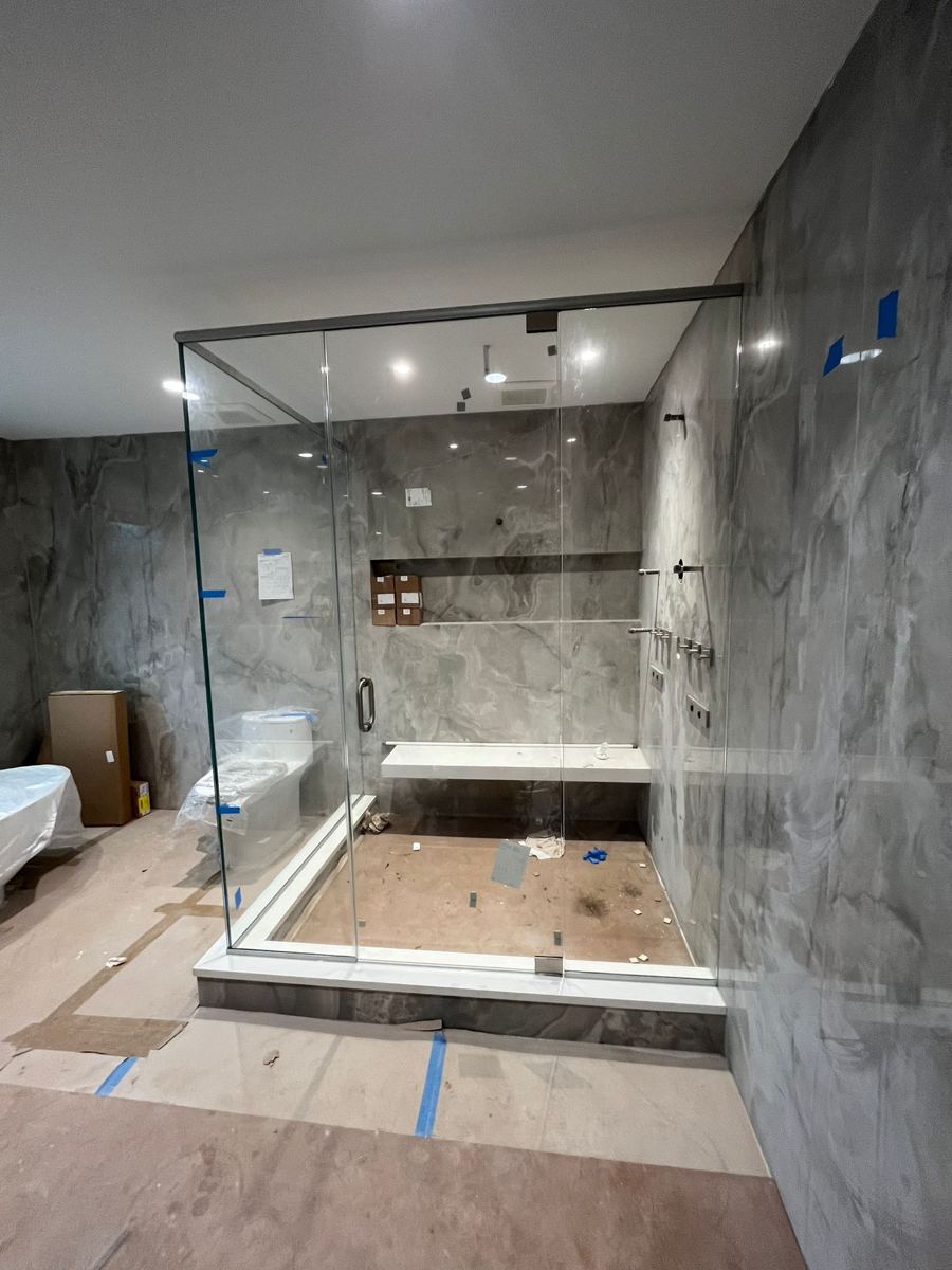 Steam shower enclosure set and taped during installation