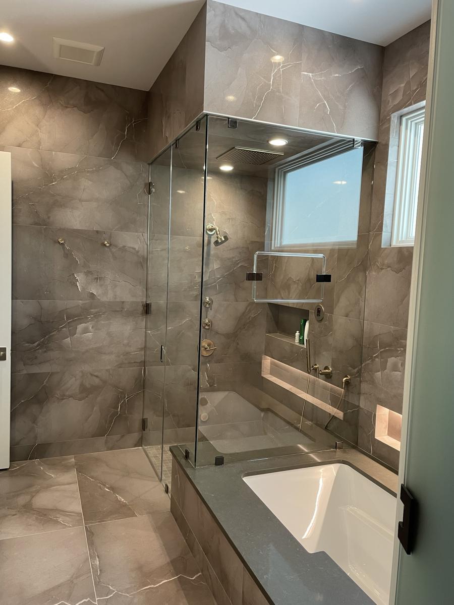 Floor-to-ceiling steam shower enclosure